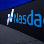 FILE PHOTO: FILE PHOTO: The Nasdaq logo is displayed at the Nasdaq Market site in New York